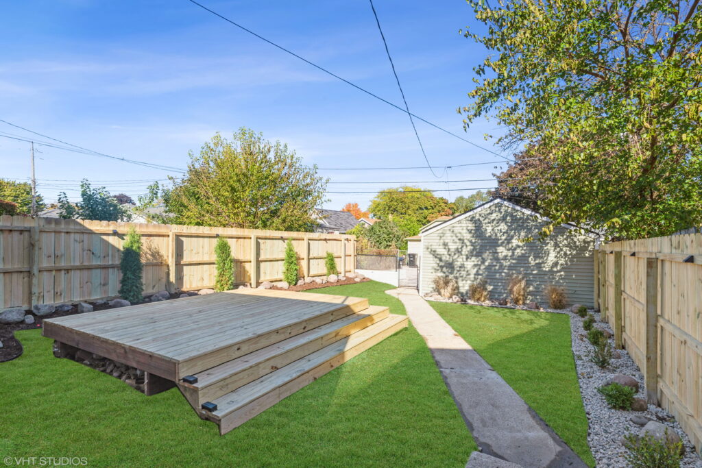 A deck being built outside.